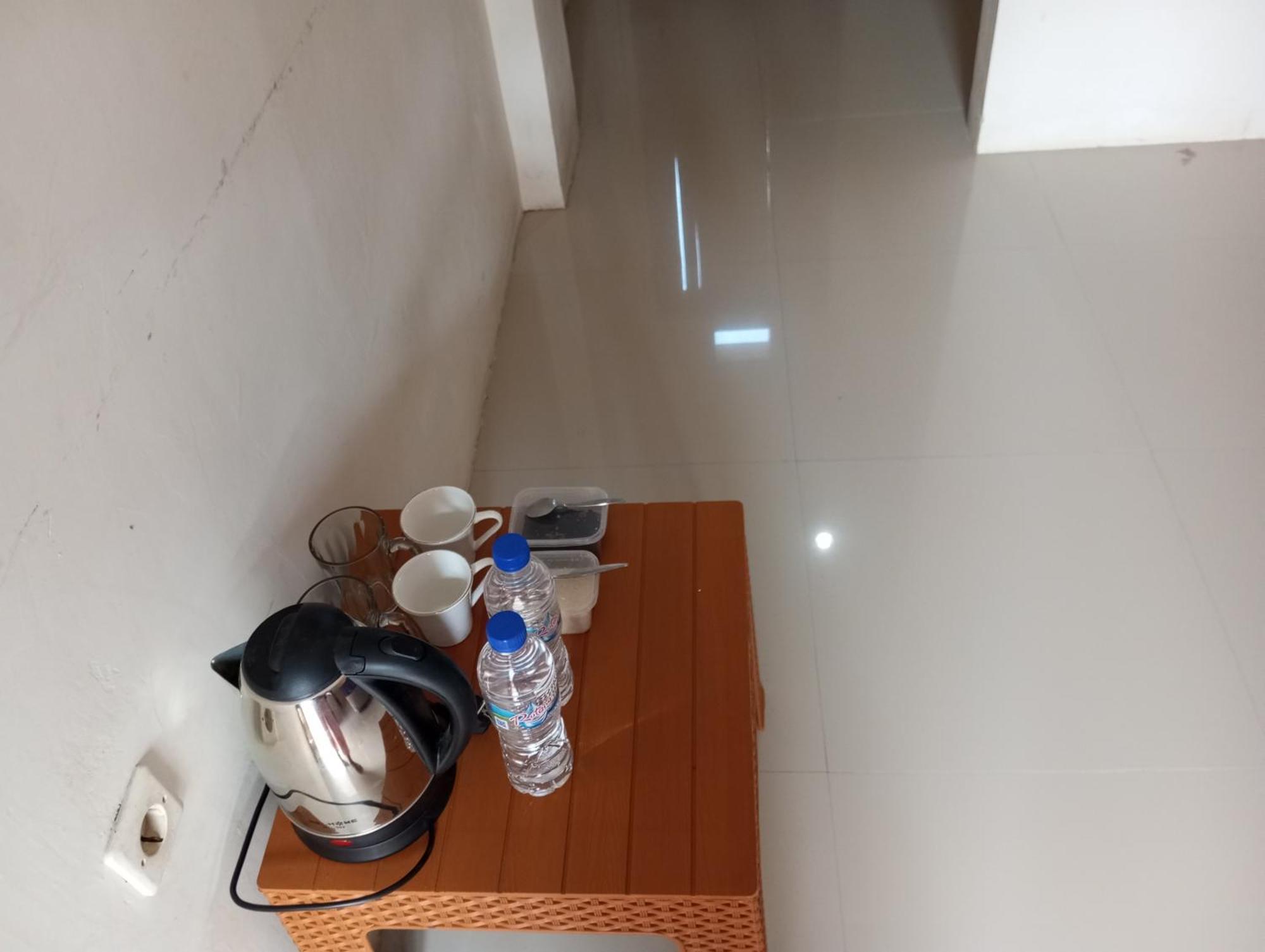 Wl Guesthouse Лабуан-Бахо Номер фото