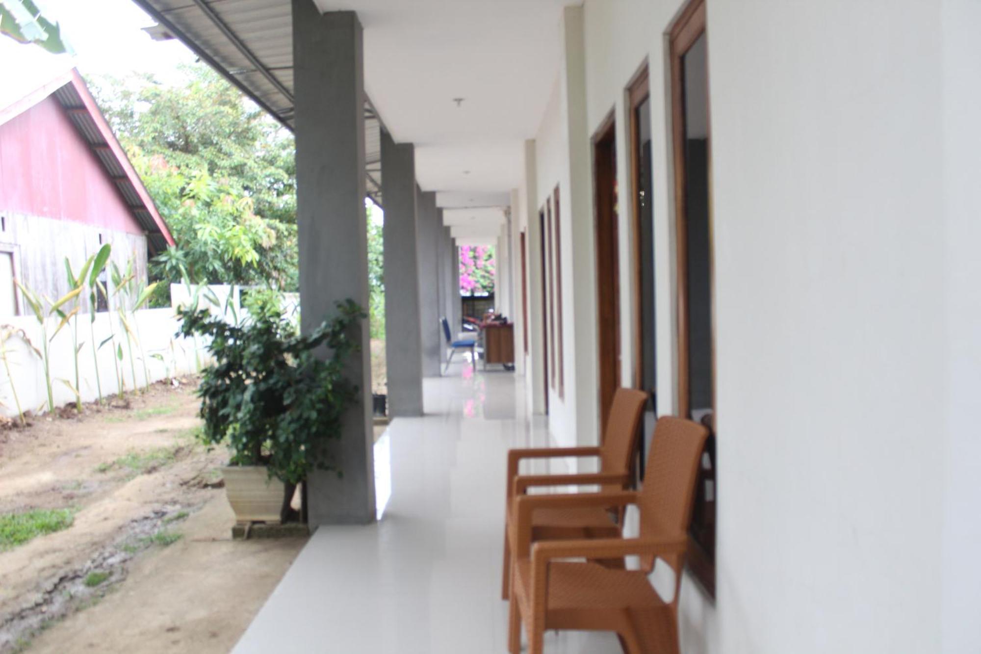 Wl Guesthouse Лабуан-Бахо Номер фото